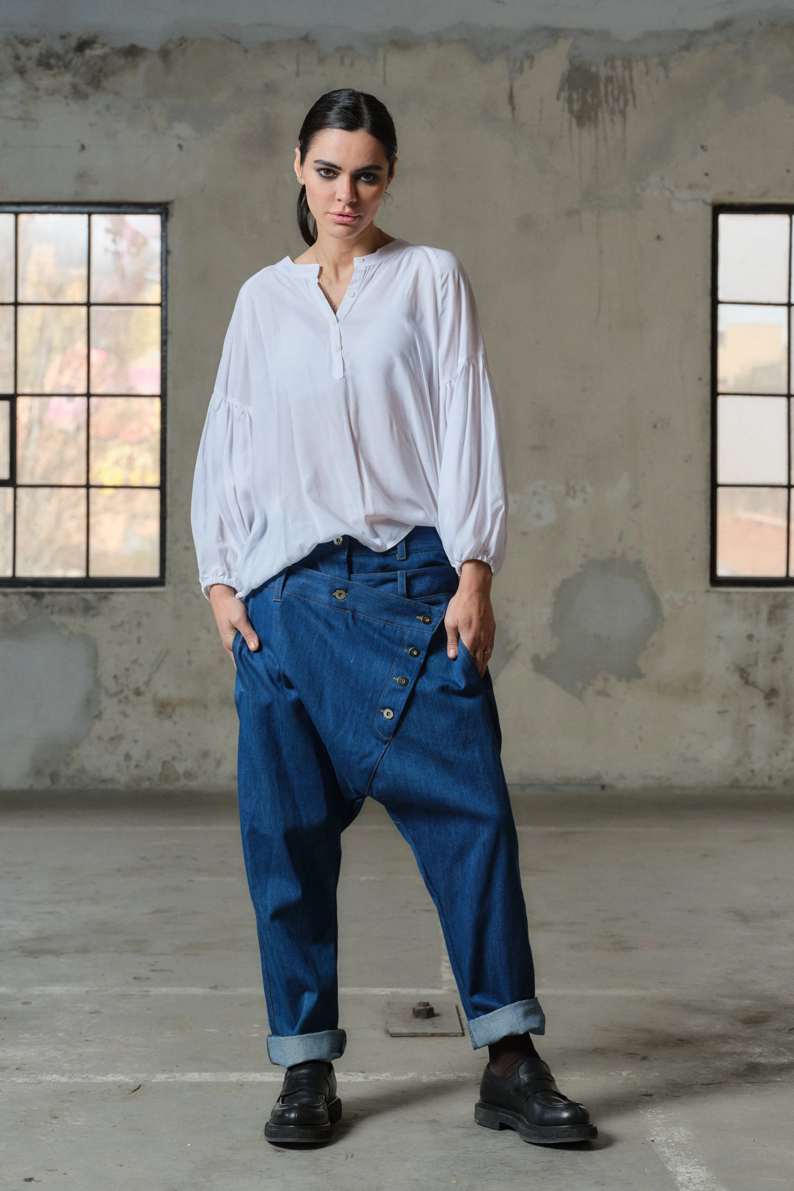 Blue denim drop crotch pants with double belt