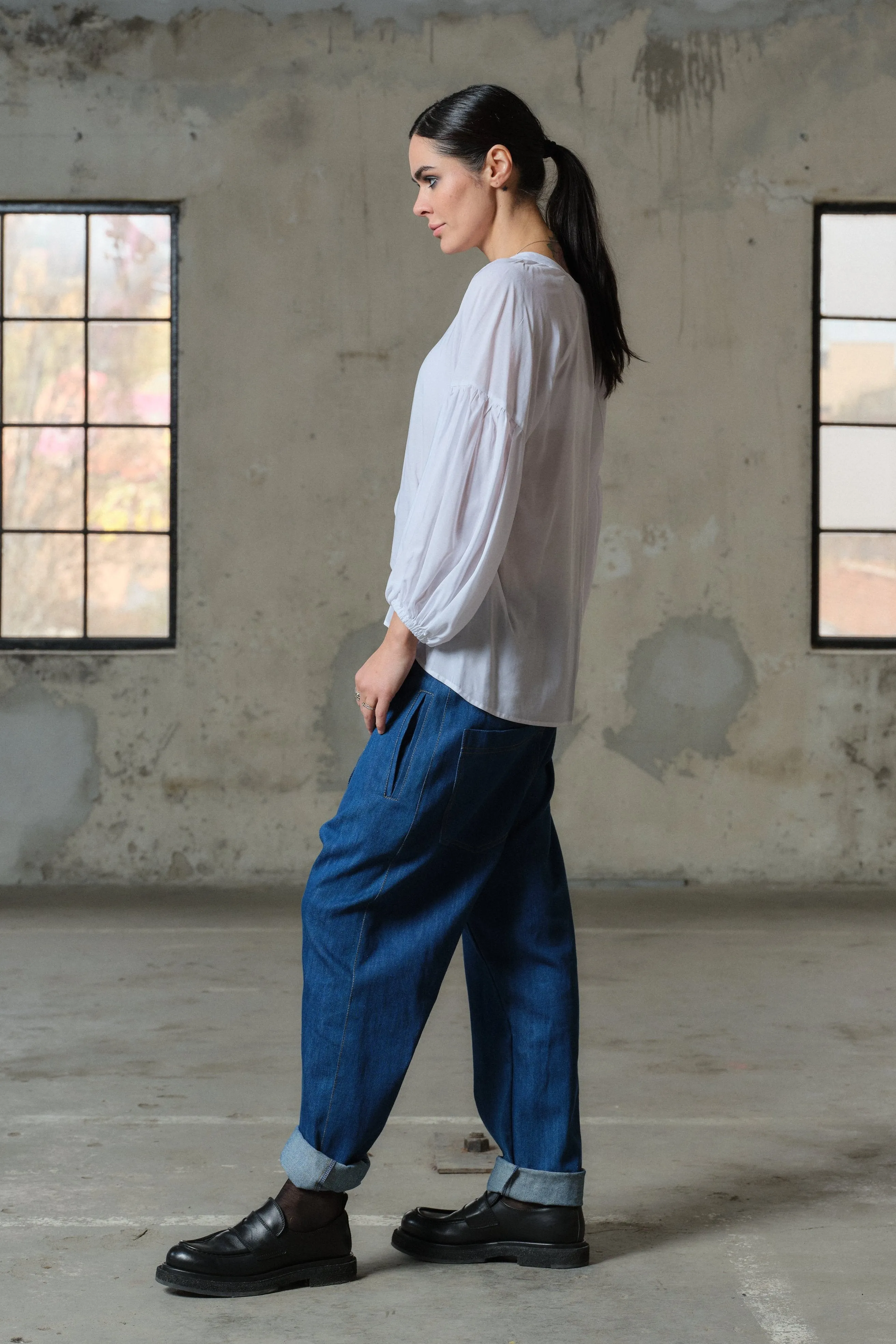 Blue denim drop crotch pants with double belt