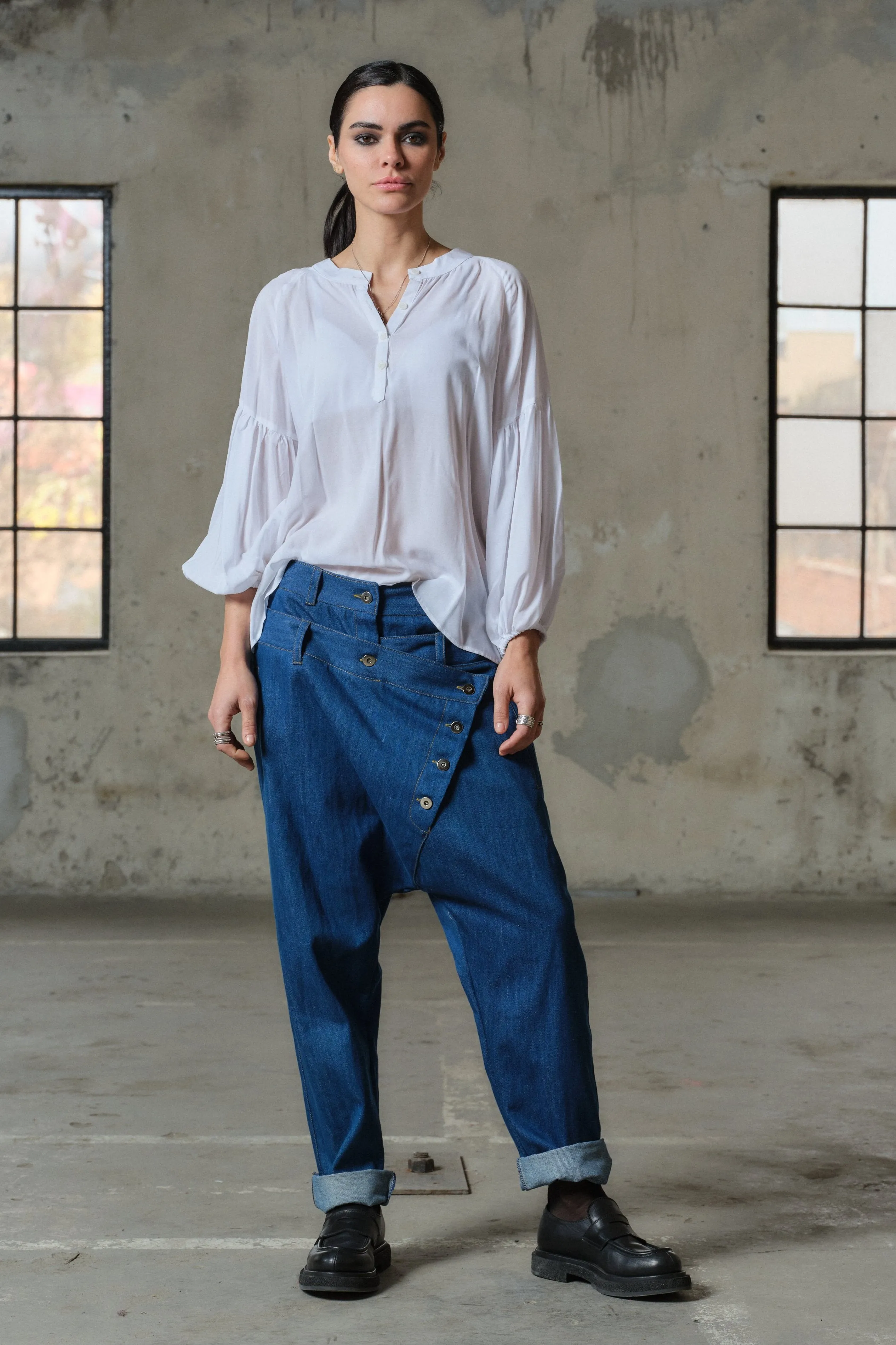 Blue denim drop crotch pants with double belt