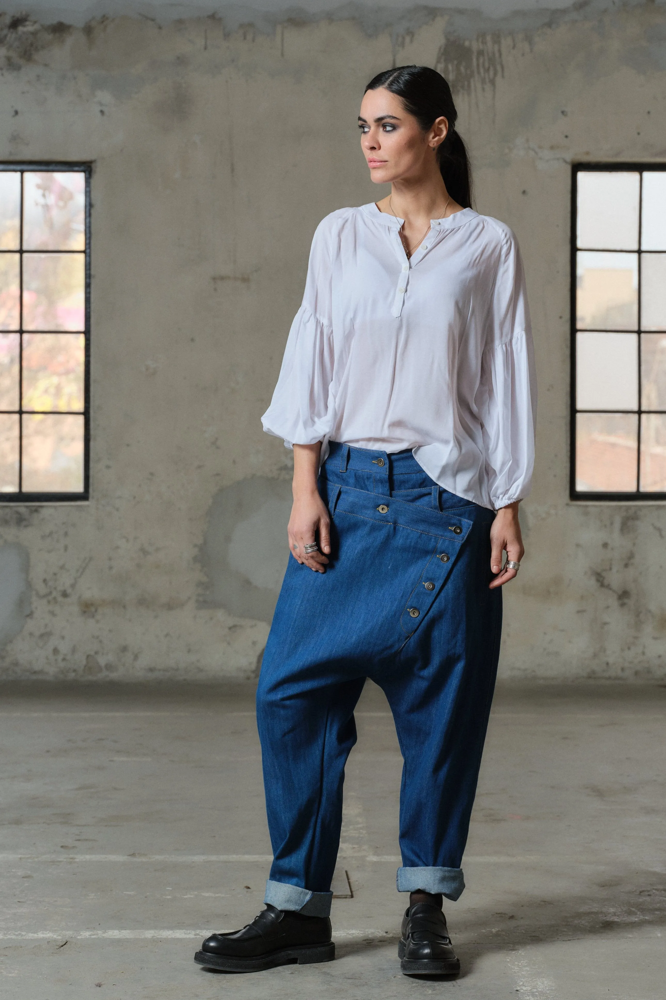 Blue denim drop crotch pants with double belt