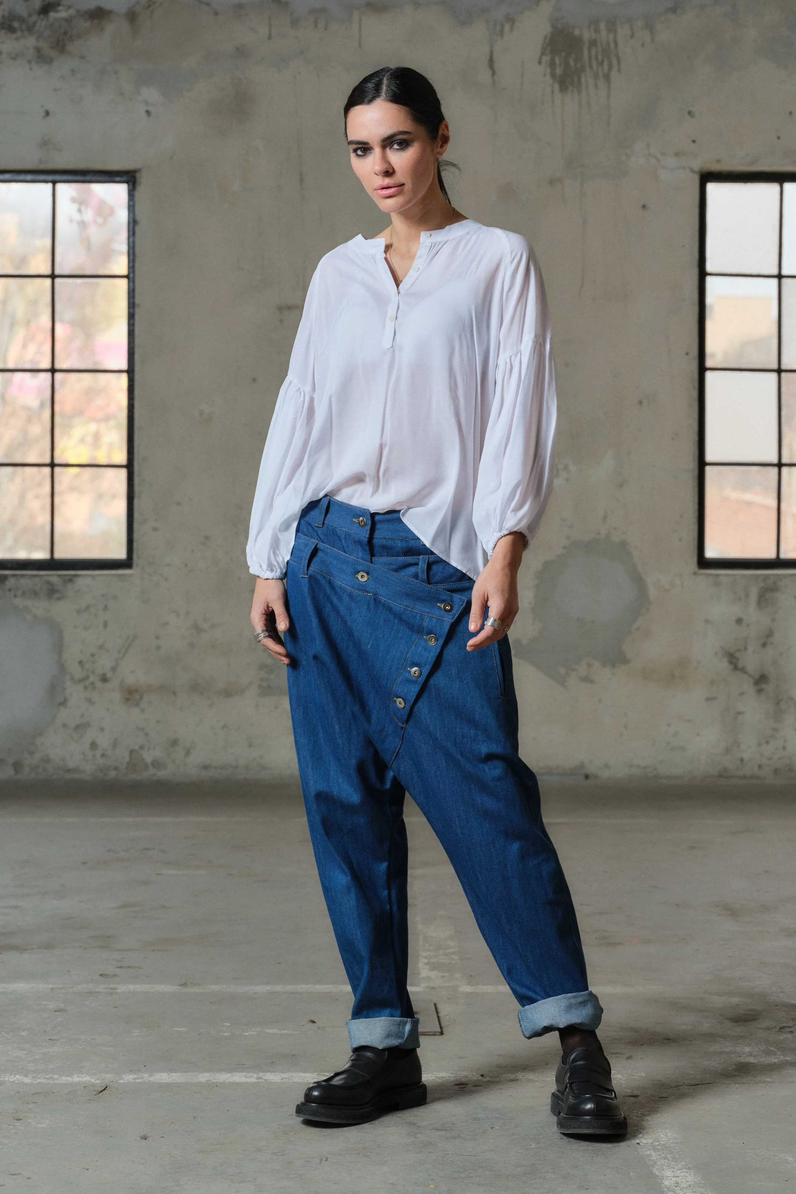 Blue denim drop crotch pants with double belt