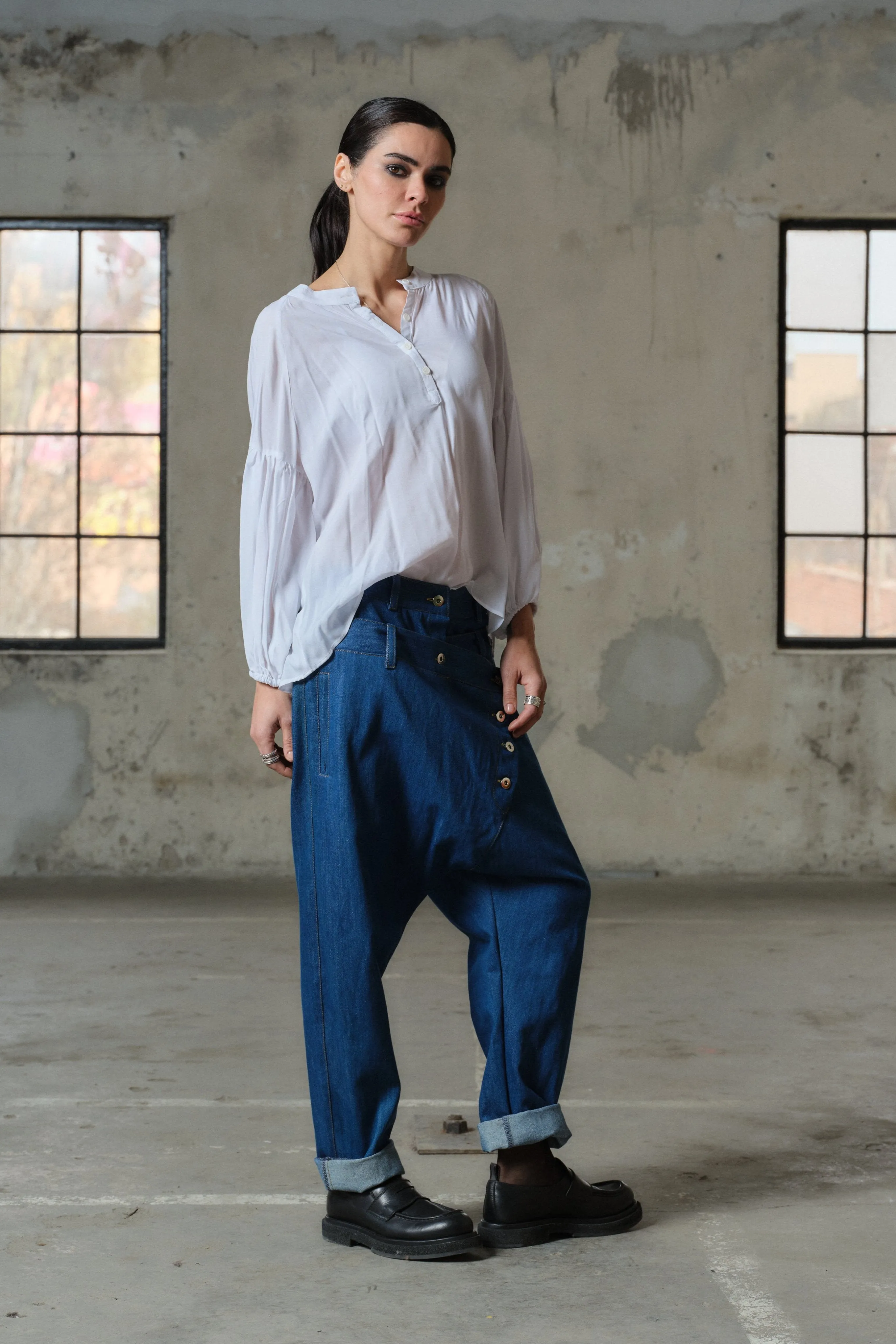 Blue denim drop crotch pants with double belt